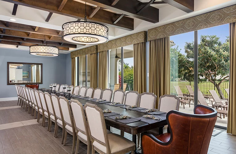 dining/conference room has a large table with seating for 32